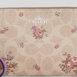 COACH Corner Zip Wristlet In Signature Canvas With Floral Print Sand Multi CAQ59