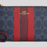 COACH Corner Zip Wristlet In Signature Canvas With Varsity Stripe Denim/Bold Red CBP19