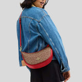 COACH Aria Shoulder Bag In Signature Canvas Tan/Carnation CCL26