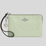 COACH Corner Zip Wristlet In Signature Leather With Heart Charm Pale Green CDF04