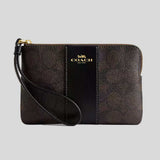 COACH Corner Zip Wristlet In Signature Canvas With Stripe Walnut/Black CW854