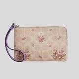 COACH Corner Zip Wristlet In Signature Canvas With Floral Print Sand Multi CAQ59