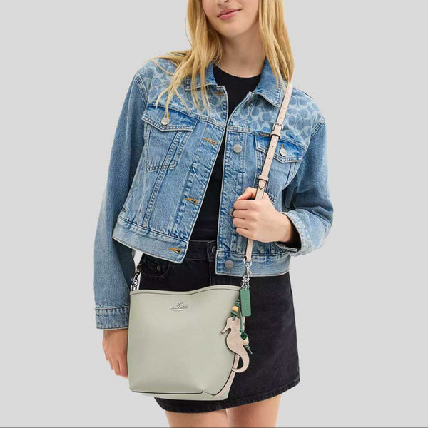 COACH City Bucket Bag With Seahorse Charm Light Pistachio/Sand CBH75