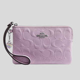 COACH Corner Zip Wristlet In Signature Leather With Heart Charm Light Violet CDF04