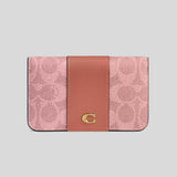 COACH Essential Slim Card Case In Signature Canvas Melon Pink CR542
