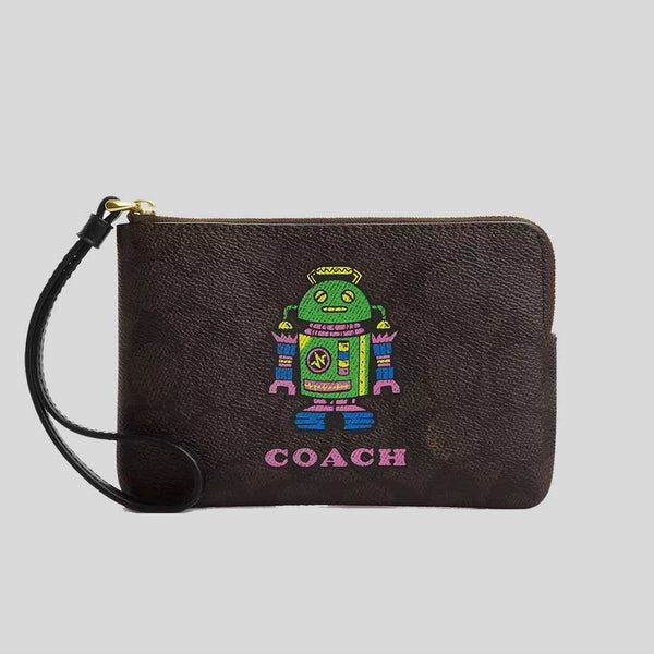 COACH Corner Zip Wristlet In Signature Canvas With Robot Print CW868