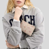 COACH Corner Zip Wristlet In Signature Canvas With Floral Print Sand Multi CAR20