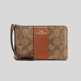 COACH Corner Zip Wristlet In Signature Canvas Khaki/Saddle CS602