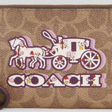 COACH Corner Zip Wristlet In Signature Canvas With Horse And Carriage Print CX589